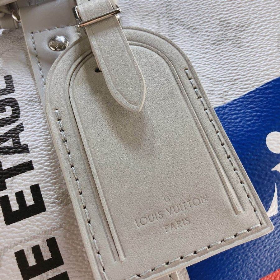 LOUIS VUITTON Monogram Logo Keepall Bandouliere 50 White