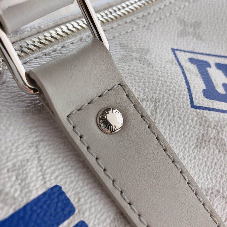LOUIS VUITTON Monogram Logo Keepall Bandouliere 50 White
