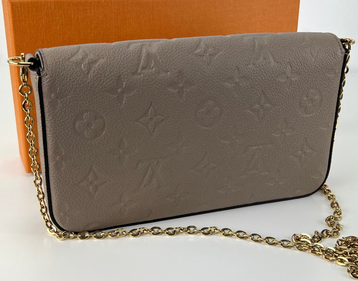Bolsa Louis Vuitton empreinte pochette felicie in dune