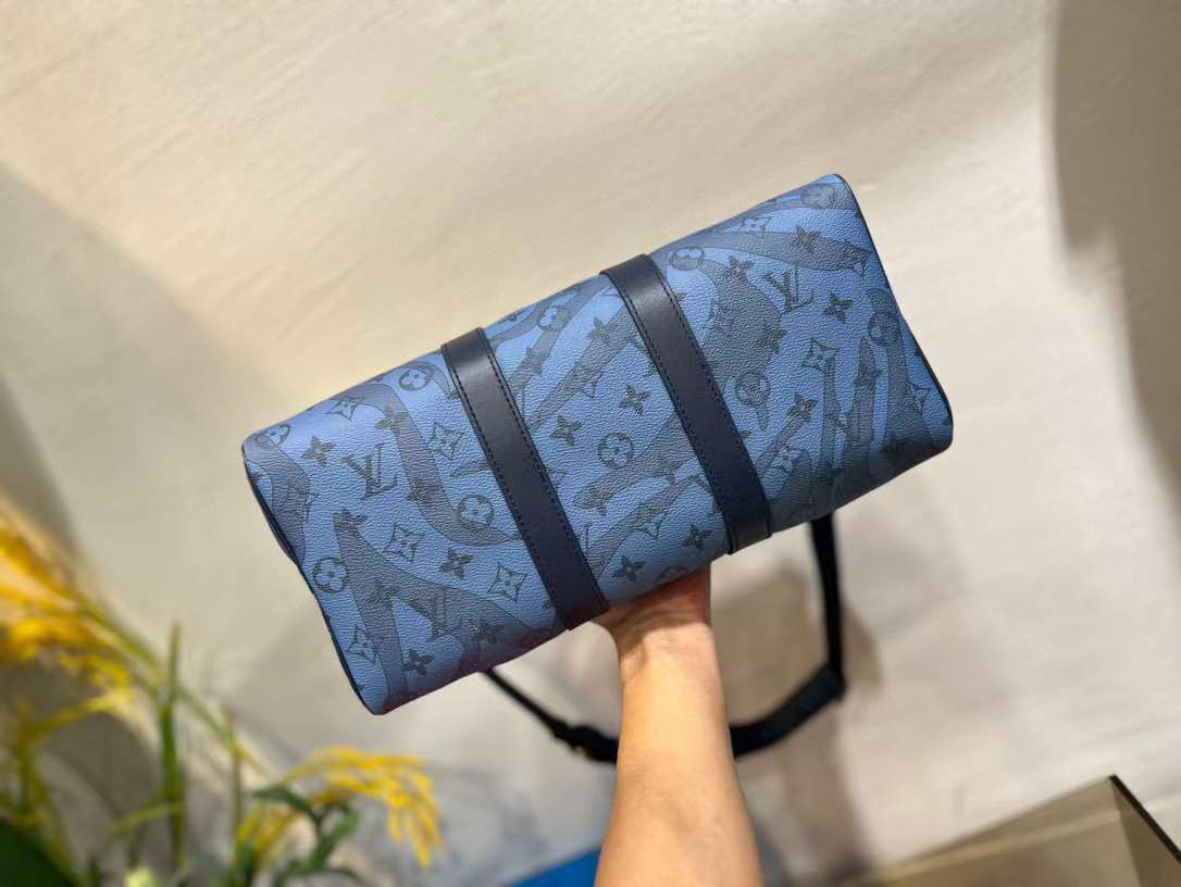 Louis Vuitton Black, Blue Taurillon Monogram Keepall