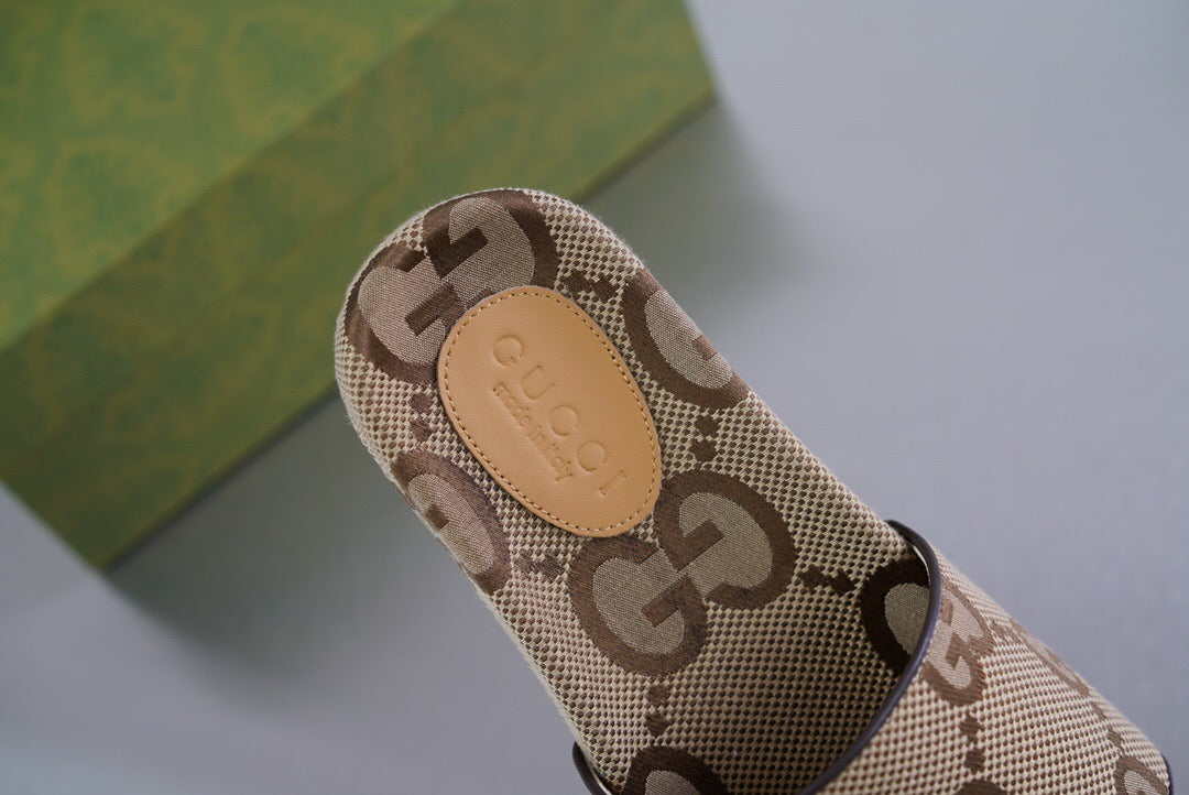 Gucci maxi GG canvas slide sandal
