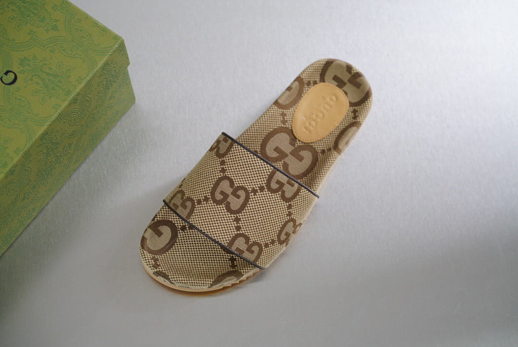 Gucci maxi GG canvas slide sandal
