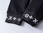 Calça Louis Vuitton Logo Gold