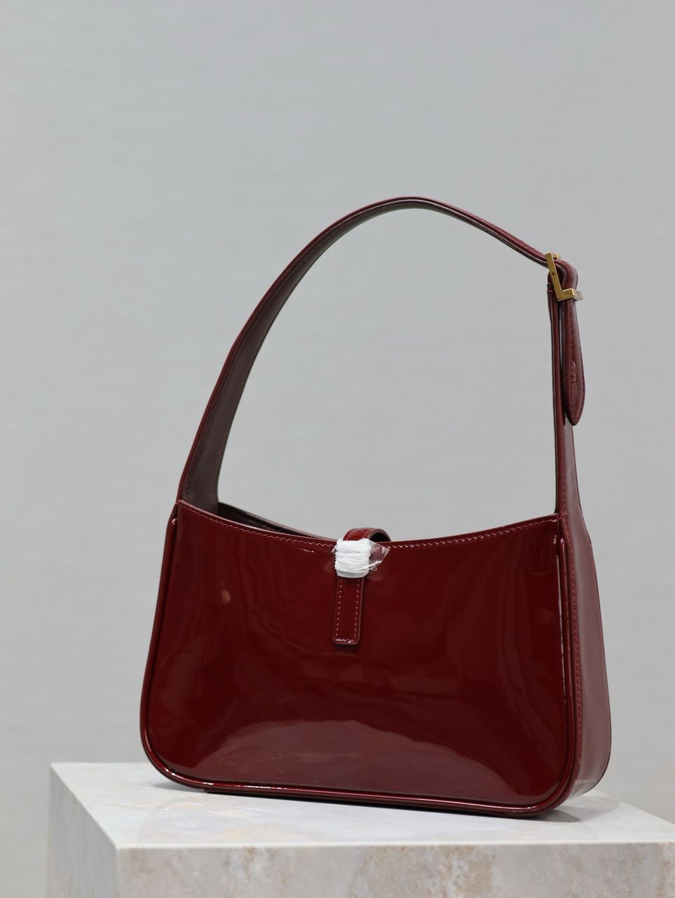 Yves Saint Laurent Mini Le 5 to 7 in Patent Leather Grenade