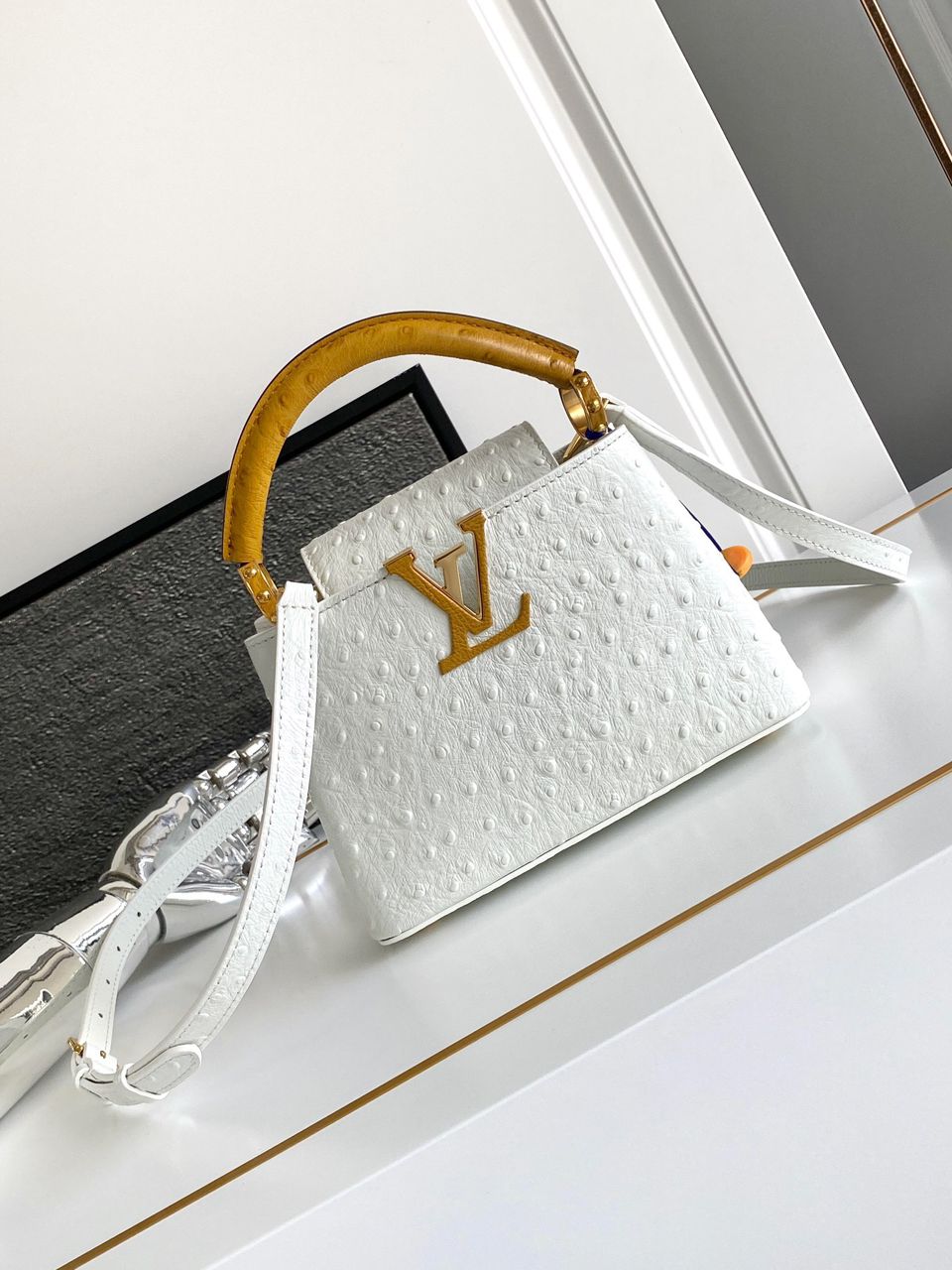 Bolsa Louis Vuitton Ostrich Capucines White