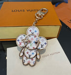 Chaveiro LV x x TM Vivienne Head Bag Charm