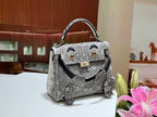 Bolsa Hermès Kelly Idole Kelly Doll in Lizard